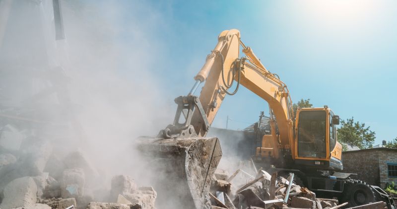 Demolition Crew Operating Equipment